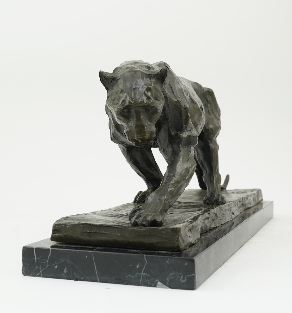 After Rembrandt Bugatti (Italian, 1884-1916): A patinated bronze of a prowling panther